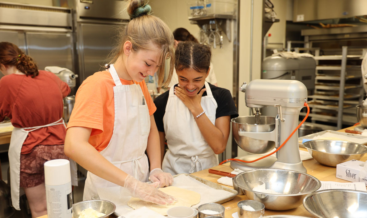 Two students in summer baking class