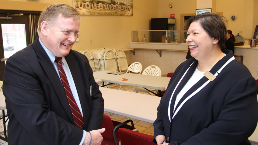Jeffrey Hayden, HCC vice president of Business and Workforce Development, talks to HCC president Christina Royal at Nuestras Raices.  
