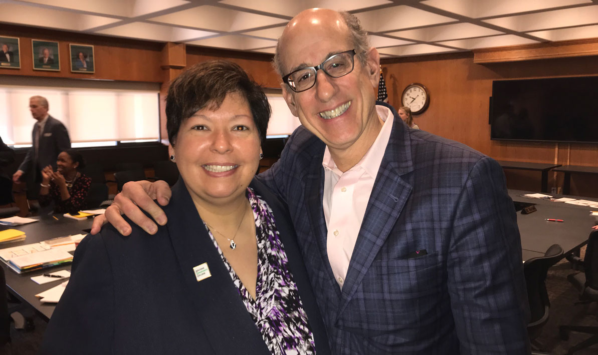 Charlie Epstein, right, with HCC president Christina Royal, after his first board meeting.