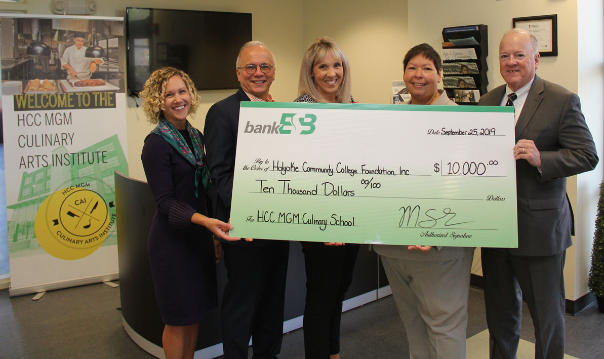 Bank EBS check presentation at HCC MGM Culinary Arts institute