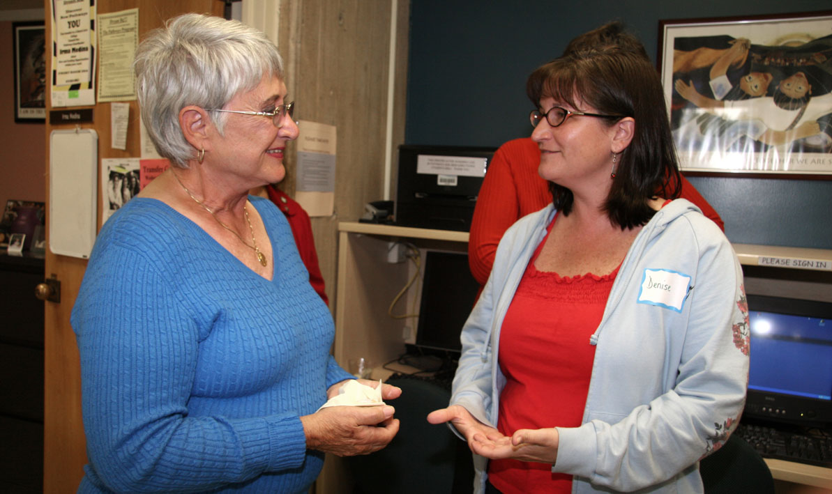 Elaine Marieb greets a student during a 2009 visit to the Elaine Marieb New Pathways Center at HCC.