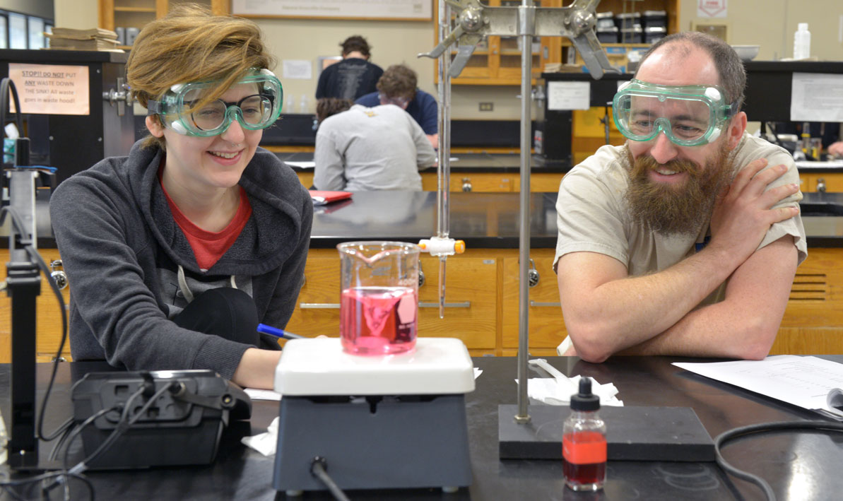 Brandi St. Romain and her lab partner work on a chemistry experiment.  