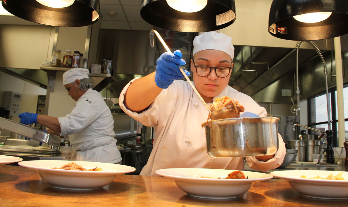 HCC student Nicole Ortiz serves lunch