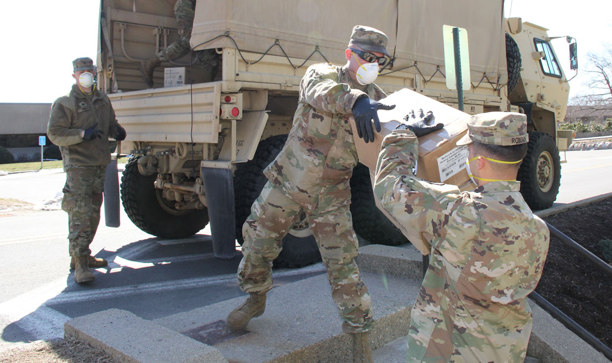 National guard troops collect donations of PPE at HCC for frontline workers battling the coronavirus pandemic in spring 2020. 