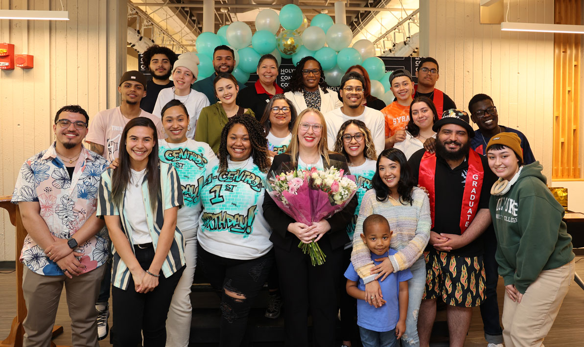 HCC staff and students gather with the El Centro staff to celebrate the programs first birthday.