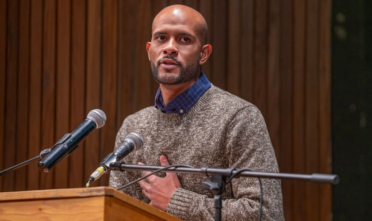 Student Marcos Figueroa speaks at HCC's first Fall Graduate Reception.