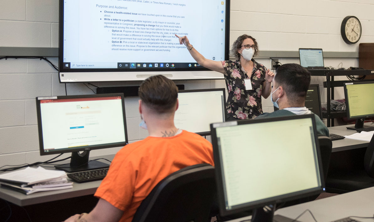 HCC professor Naomi Lesley teaches a composition class at the Ludlow jail through WMass CORE.