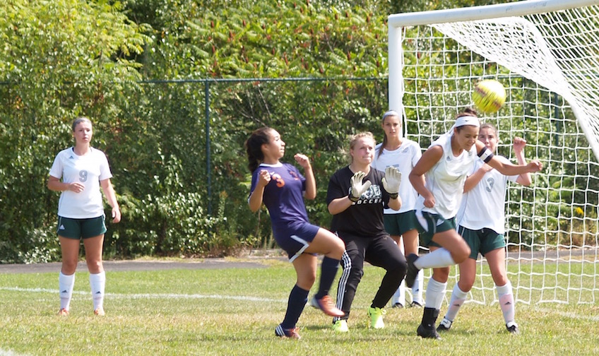Zollo and women's soccer game action