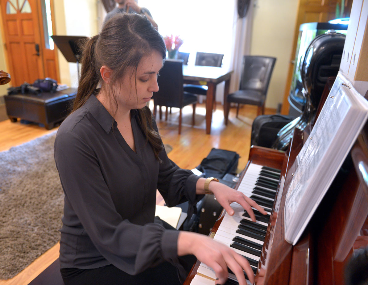 Lisa plays piano in the family band. 
