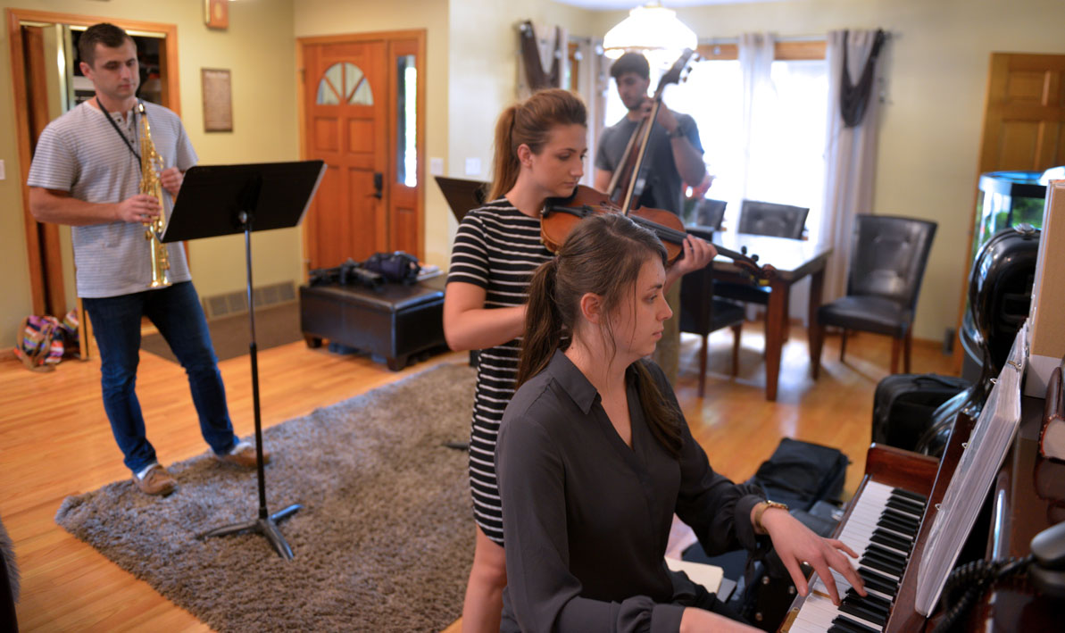 The Dubchaks rehearse in their Westfield home.