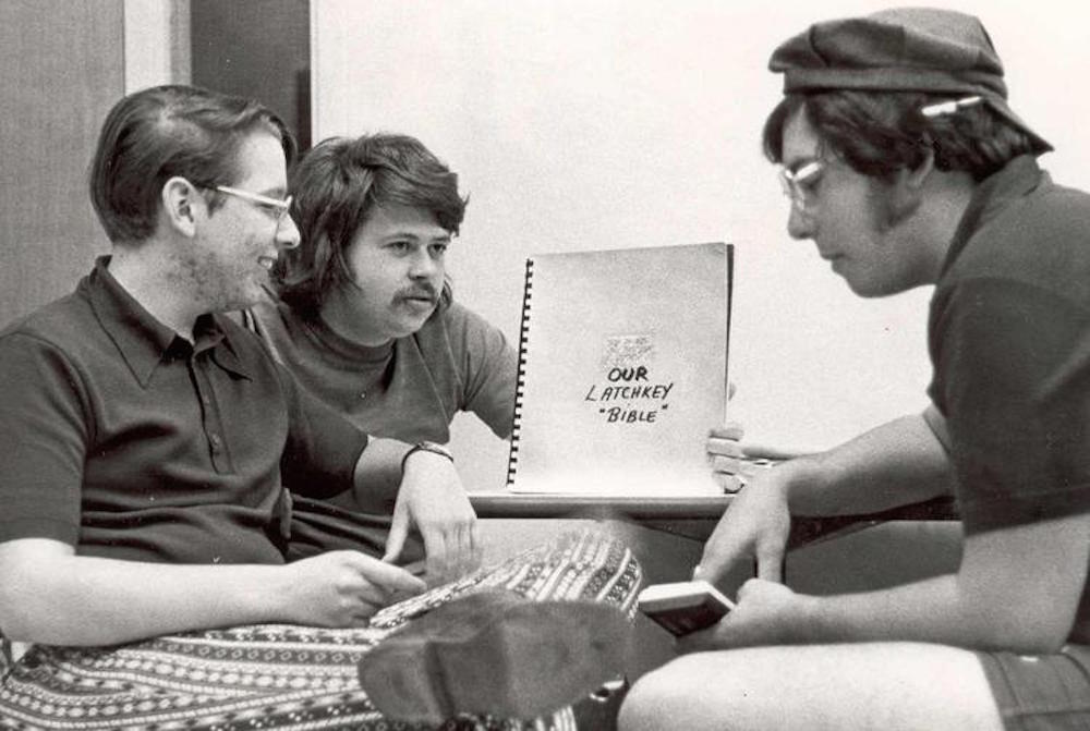 Three students work on the 1975 yearbook