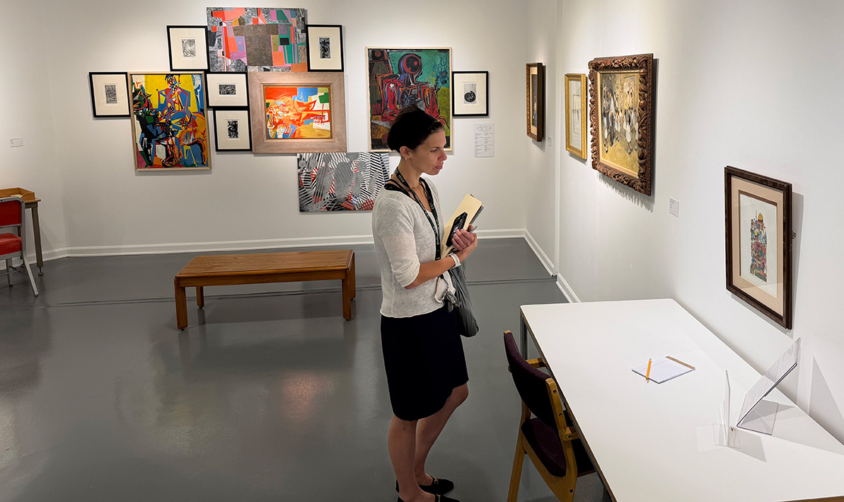 A gallery visitor explored the "Retro Active" exhibit at the Taber Art Gallery.