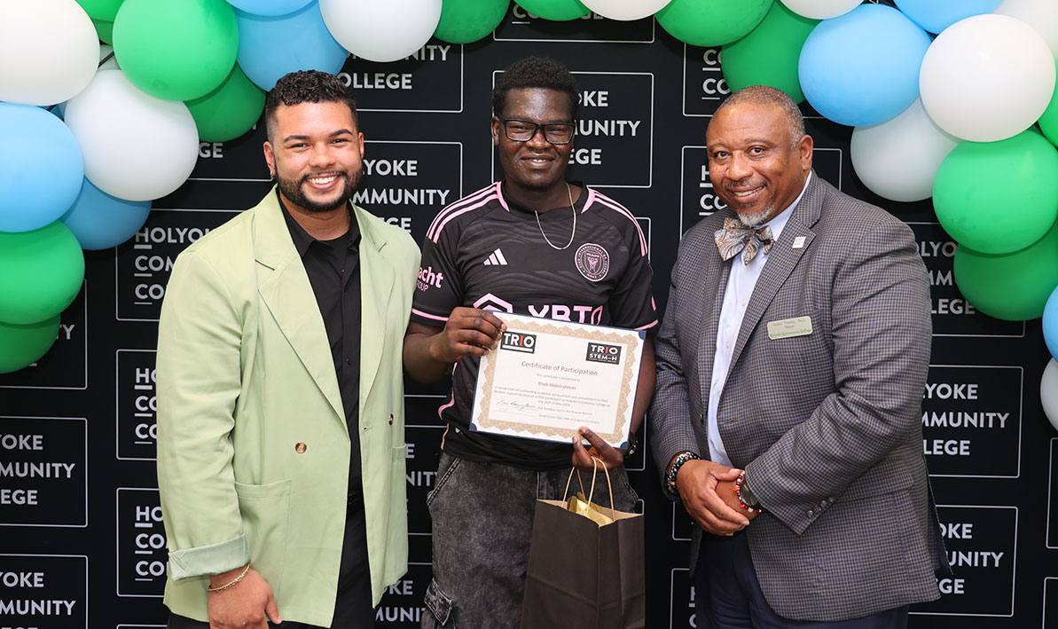Criminal justice major Ehab Abdelrahman '24 accepts his TRIO certificate at a special reception on May