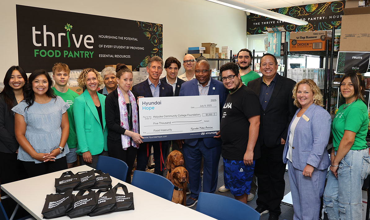 Hyundai representatives present $5,000 check to Thrive Food Pantry