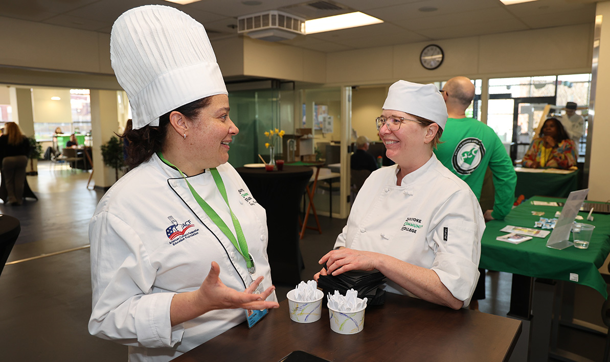 Chef Tracy Carter, with HCC culinary arts student Tiffany Mackey, during an open house at the HCC MGM Culinary Arts Institute.