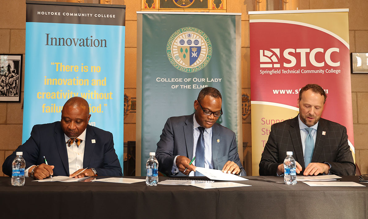 Presidents of HCC, STCC, and Elms colleges sign a housing pact. 