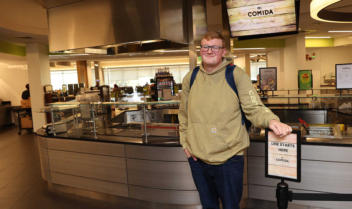 Aidan Cavanaugh in the HCC cafeteria 