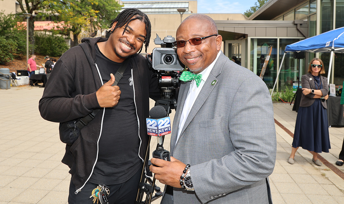 WWLP news photographer Simeon Brown '17 and President George Timmons