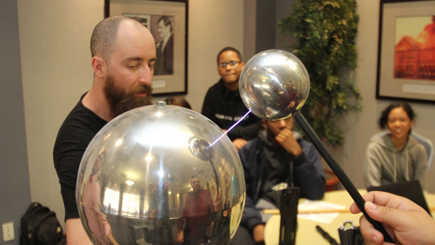 A spark passes between two conductors at Engineering Day